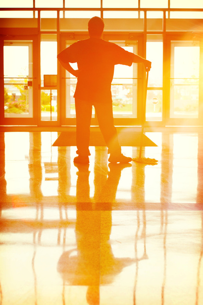 Janitor Resting after Mopping